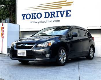 The 2012 Mattelic Black Subaru Impreza Sports AWD